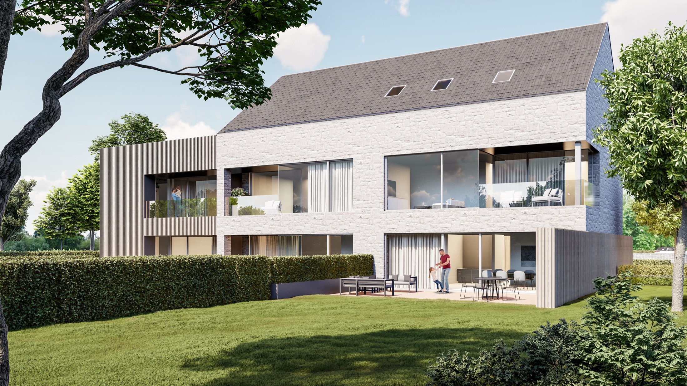 Résidence Saint-Séverin 110 à Nandrin, façade en pierre du Condroz côté jardin, architecture signée Luc Spits